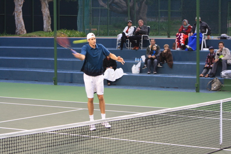 John Isner volleys at the Inagural Charity Challenge at the Manhattan Country Club